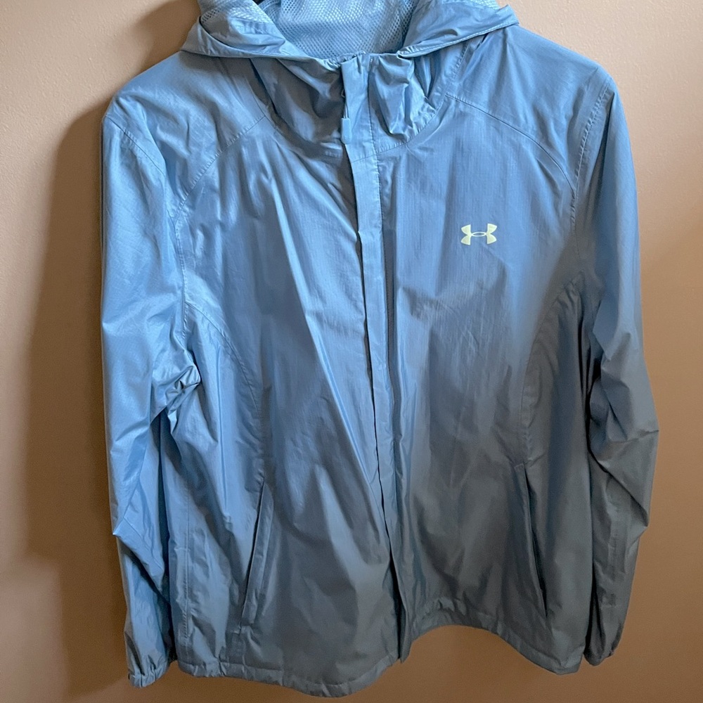 Under Armour light blue raincoat w/ hood. Like new. Size Large.